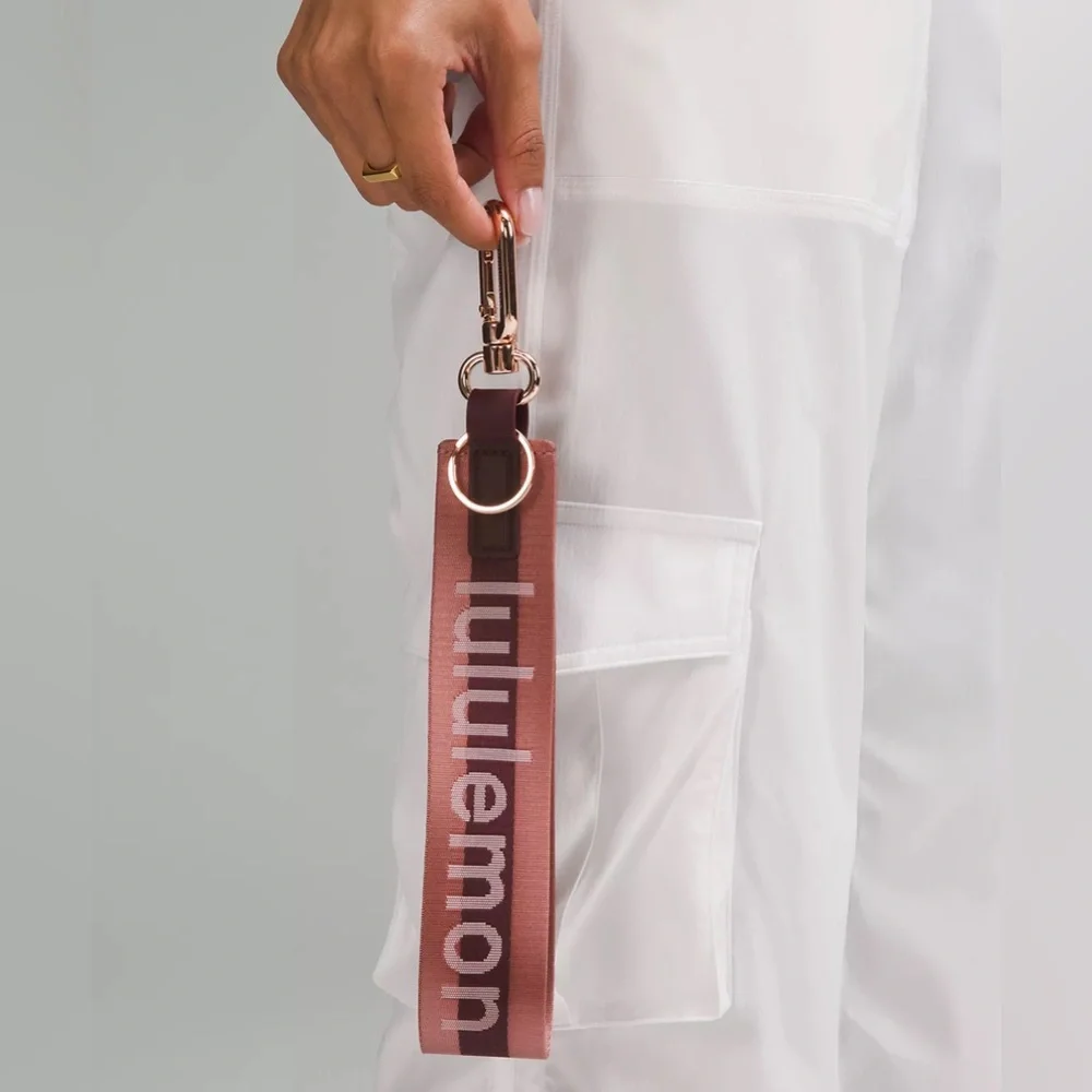 Lululemon Never Lost Keychain Wordmark- Garnet/Spiced Chai/Rose Gold